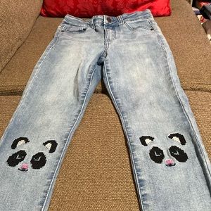 Girl’s jeans. Light blue with cat embroidery on both knee.